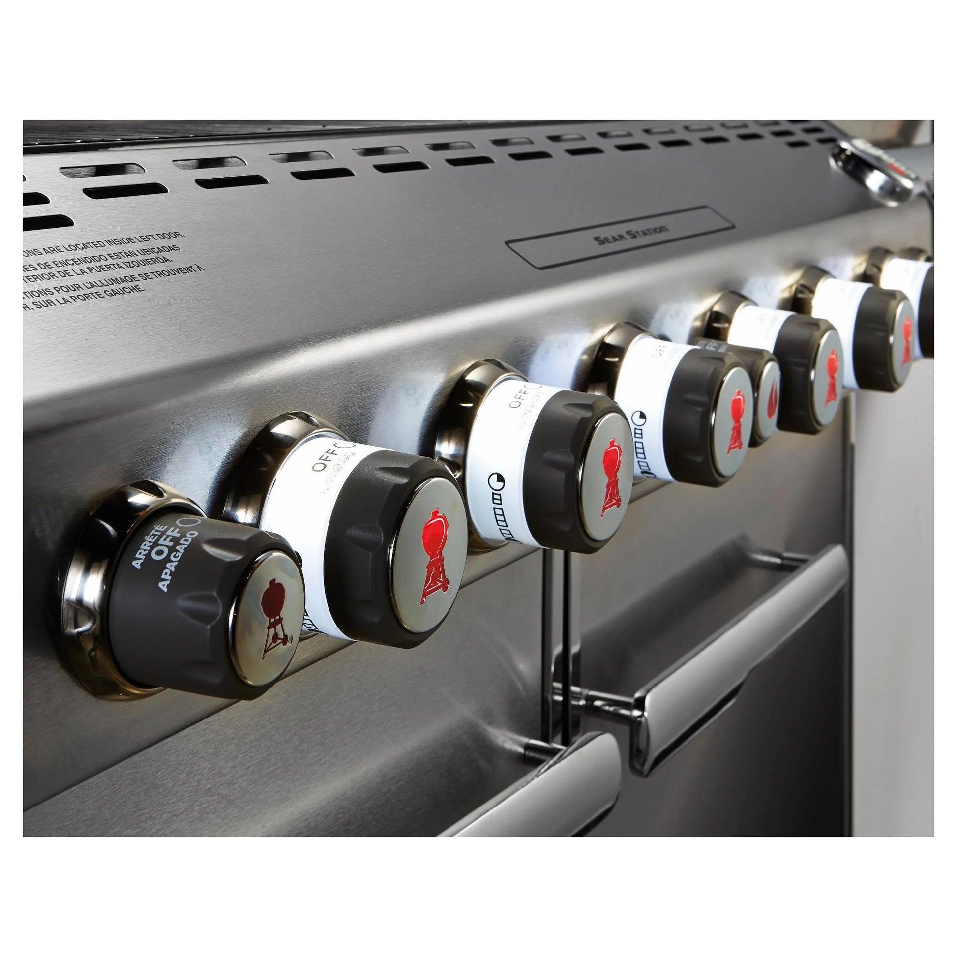 close up of the knobs of silver Weber Summit E - 670 BBQ