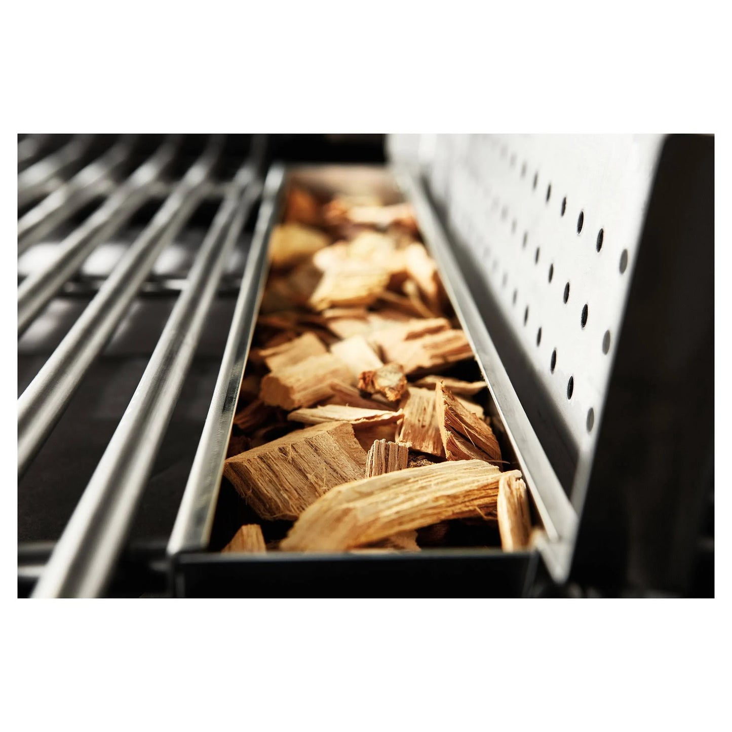 photo showing where you can put wood chips for smoking