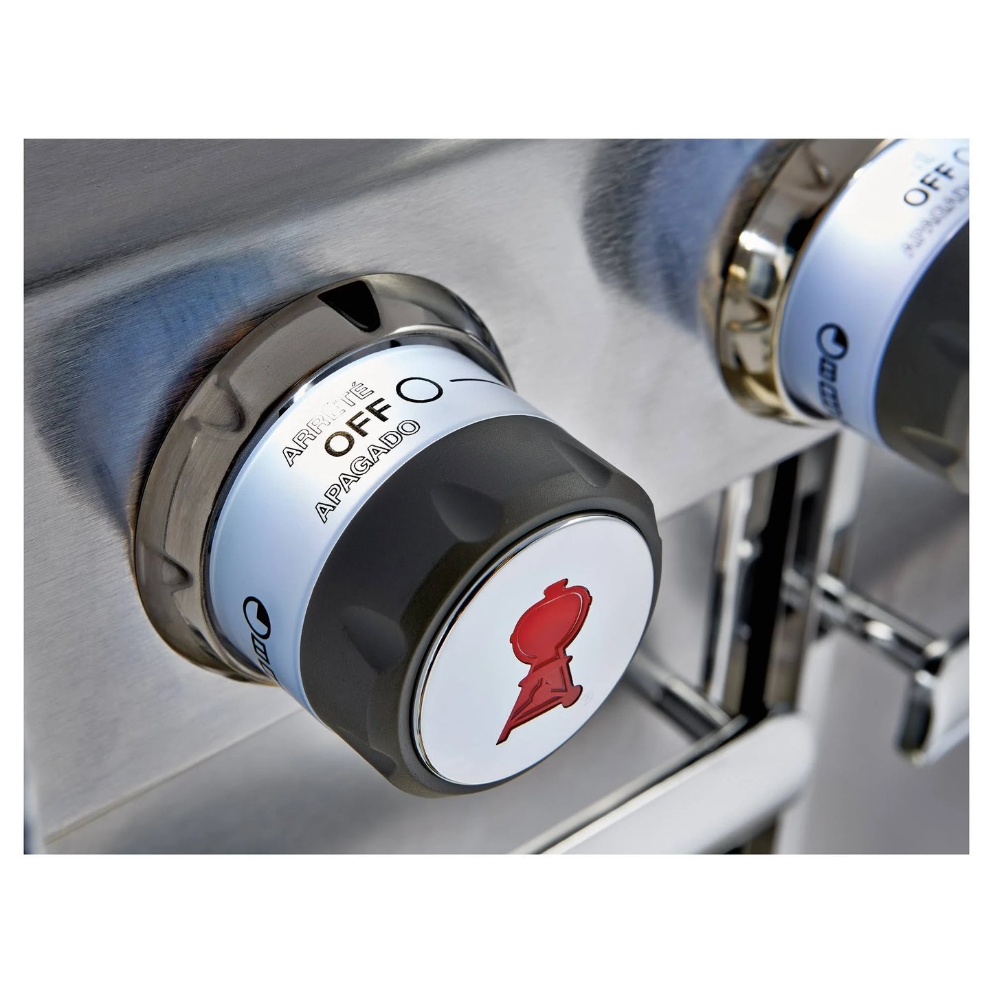 super close up of the knobs of silver Weber Summit E - 670 BBQ